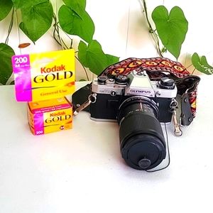 Vintage OLYMPUS OM10 Manual SLR Camera with Vivitar 70-150mm macro focusing zoom